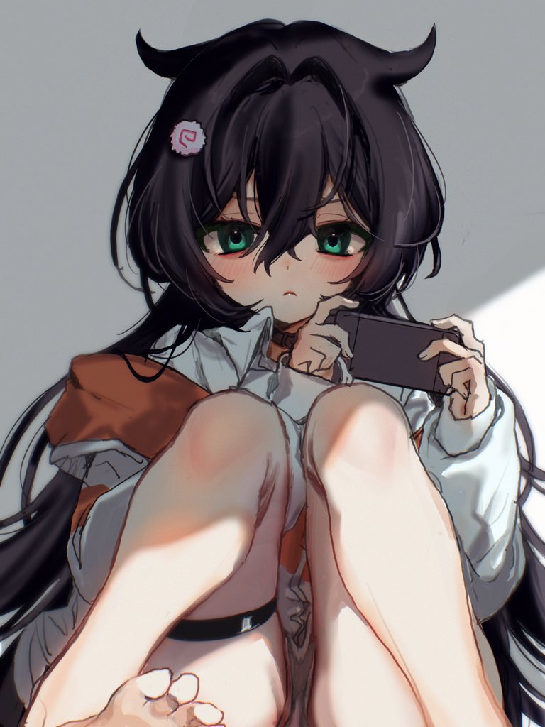 1girl, blush, brown_hair, closed_mouth, collared_shirt, food, frown, goddess_of_victory:_nikke, green_eyes, hair_intakes, hair_ornament, holding, hutondeoyasumi, jacket, kamaboko, long_hair, looking_at_viewer, multicolored_jacket, narutomaki, off-shoulder_shirt, off_shoulder, orange_jacket, shirt, shorts, sitting, solo, thigh_strap, trony_(nikke), two-tone_jacket, white_jacket, white_shirt, white_shorts