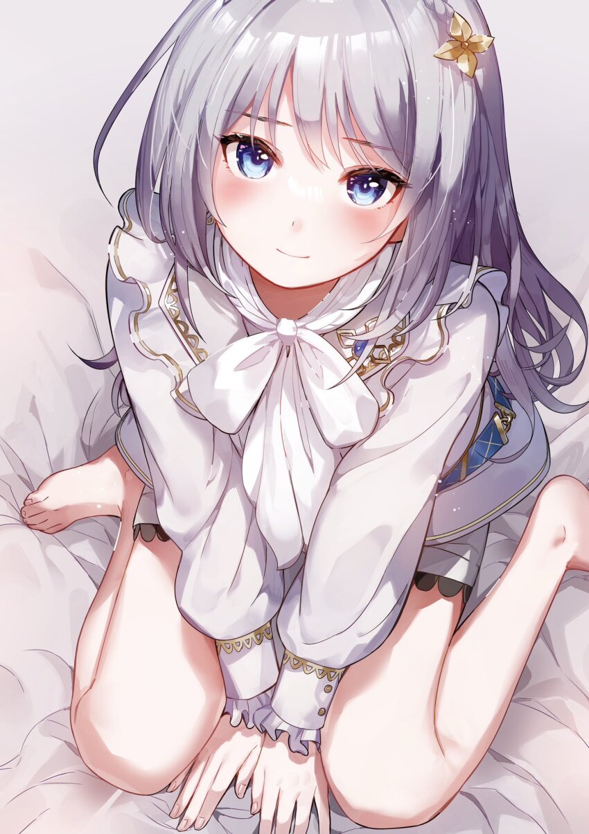 1girl, arms_between_legs, bare_legs, barefoot, bed_sheet, blouse, blue_eyes, blush