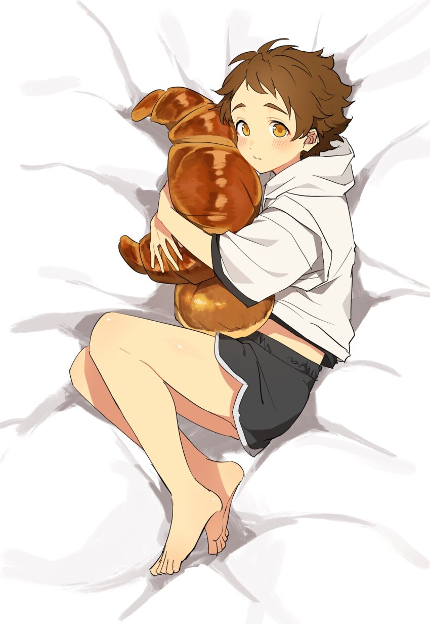 1boy, akari-chan_(e), barefoot, bed_sheet, black_shorts, croissant, dakimakura_(medium), dolphin_shorts, dot_nose, ensemble_stars!, food, food-themed_pillow, from_above, full_body, highres, hood, hood_down, hoodie, hugging_object, layered_clothes, light_blush, lying, male_focus, midriff_peek, on_side, pillow, raised_eyebrows, shirt, shorts, sleeveless, sleeveless_hoodie, three-quarter_sleeves, solo, split_mouth, tenma_mitsuru, white_hoodie, white_shirt