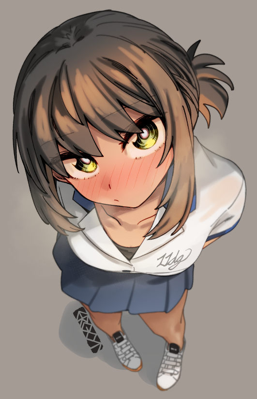 1girl, arms_behind_back, blue_skirt, blush, breasts, brown_hair, closed_mouth, clothes_writing, commentary_request, ergot, fubuki_(kancolle), fubuki_(round1)_(kancolle), green_eyes, grey_background, hair_between_eyes, kantai_collection, looking_at_viewer, nose_blush, official_alternate_costume, ponytail, shirt, shoes, short_ponytail, signature, simple_background, skirt, solo, standing, white_shoes