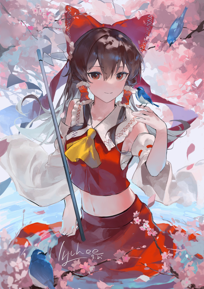 1girl, absurdres, ascot, bird, bird_on_hand, blue_bird, bow, brown_eyes, brown_hair, cherry_blossoms, chinese_commentary, closed_mouth, commentary, detached_sleeves, falling_petals, frilled_bow, frilled_hair_tubes, frills, gohei, hair_bow, hair_tubes, hakurei_reimu, highres, lizhi004717, long_hair, midriff, navel, partially_submerged, petals, pink_petals, red_bow, red_skirt, ribbon-trimmed_sleeves, ribbon_trim, signature, skirt, skirt_set, smile, solo, touhou, water, yellow_ascot