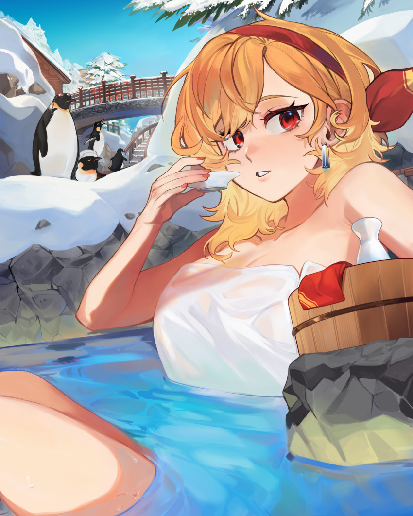 1girl, bird, blonde_hair, breasts, bridge, cleavage, commentary, commission, day, earrings, english_commentary, eus_ing, highres, hololive, hololive_indonesia, jewelry, kaela_kovalskia, large_breasts, looking_at_viewer, naked_towel, outdoors, partially_submerged, penguin, red_eyes, second-party_source, snow, snowscape, solo, towel, tree, virtual_youtuber, water