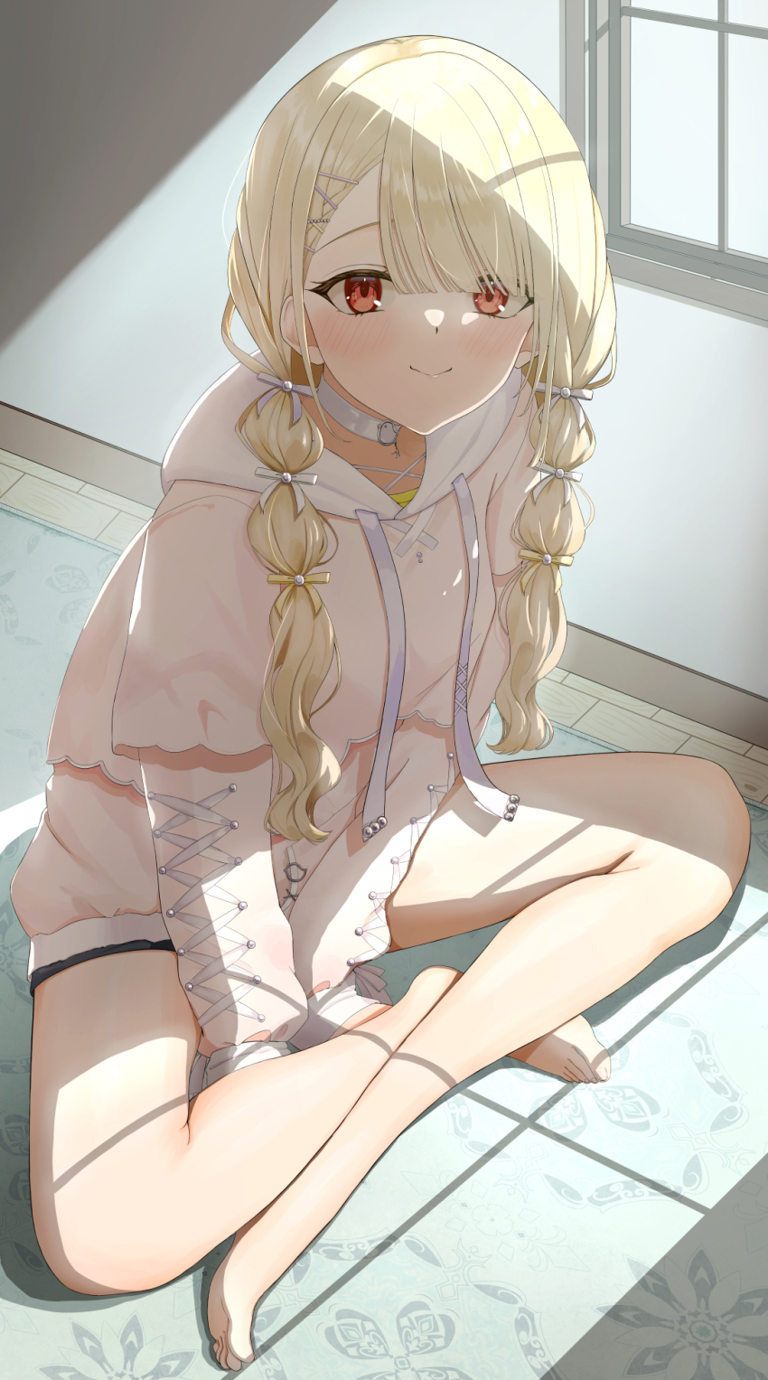 1girl, arm_between_legs, barefoot, black_shorts, blonde_hair, blunt_bangs, braid, cheshirena3, choker, drawstring, hair_ribbon, highres, hood, hood_down, hoodie, indian_style, kogara_toto, layered_clothes, looking_at_viewer, on_floor, pink_hoodie, red_eyes, ribbon, shadow, shorts, sitting, smile, solo, swept_bangs, twin_braids, virtual_youtuber, vspo!, white_choker, white_ribbon, window