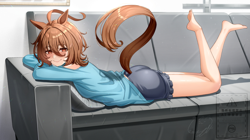 1girl, agnes_tachyon_(umamusume), ahoge, alternate_costume, animal_ears, ass, blue_sweater, blush, brown_hair, closed_mouth, clothing_cutout, commentary_request, couch, crossed_arms, earrings, feet, frilled_shorts, frills, hair_between_eyes, highres, horse_ears, horse_girl, horse_tail, indoors, jewelry, legs_up, long_sleeves, lying, messy_hair, motusii, on_couch, on_stomach, pillow, red_eyes, shelf, short_hair, shorts, signature, single_earring, smile, soles, solo, sunlight, sweater, tail, tail_through_clothes, the_pose, toes, umamusume