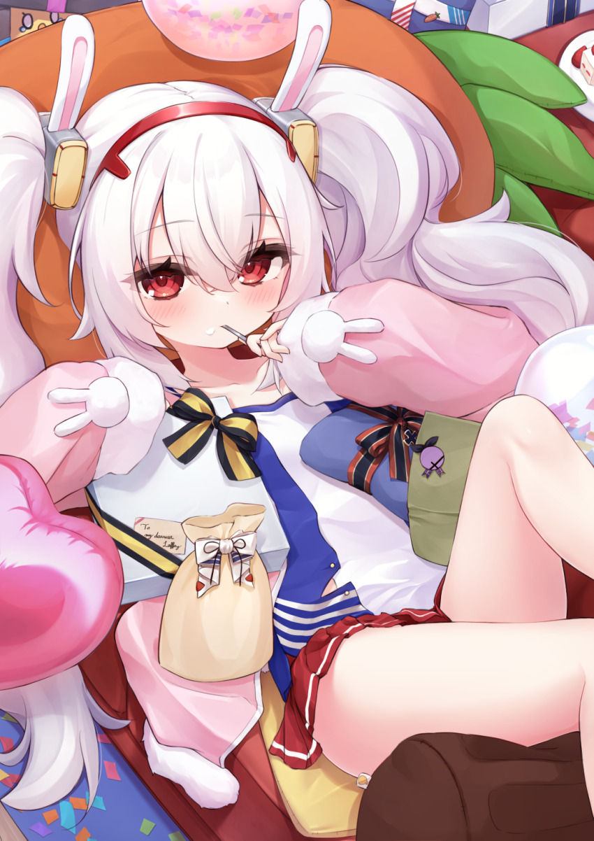 1girl, animal_ears, azur_lane, balloon, birthday, birthday_cake, box, cake, carrot-shaped_pillow, collarbone, commentary, couch, english_text, fake_animal_ears, flat_chest, food, food_on_face, gift, gift_box, grey_hair, hair_between_eyes, hairband, happy_birthday, heart_balloon, highres, jacket, kakuzatou_(lump_of_sugarr), knee_up, laffey_(azur_lane), long_sleeves, looking_at_viewer, lying, manjuu_(azur_lane), on_back, on_couch, open_clothes, open_jacket, pink_jacket, pleated_skirt, rabbit_ears, red_eyes, red_hairband, red_skirt, shirt, skirt, solo, thighs, utensil_in_mouth, white_shirt
