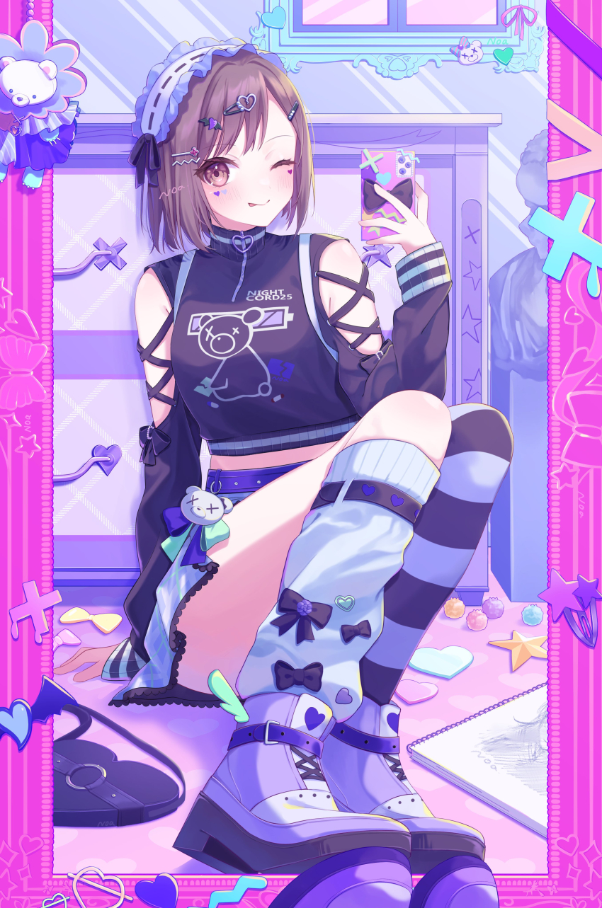 1girl, absurdres, animal_charm, asymmetrical_legwear, bag, belt, bob_cut, bow, brown_eyes, brown_hair, cellphone, charm_(object), clothing_cutout, crop_top, cross-laced_clothes, cross-laced_footwear, cross-laced_sleeves, decora, facial_mark, frilled_headwear, hair_ornament, hairclip, highres, leg_warmers, long_sleeves, mirror, mirror_selfie, mismatched_legwear, miteinano_(mitei_nano28), negai_wa_itsuka_asa_wo_koete_(project_sekai), official_alternate_costume, on_floor, one_eye_closed, pastel_colors, phone, plaid_clothes, plaid_skirt, project_sekai, purple_footwear, quarter-zip, selfie, shinonome_ena, short_hair, sitting, sketchbook, skirt, smartphone, solo, striped_clothes, tongue, tongue_out, wing_decorations, yami_kawaii