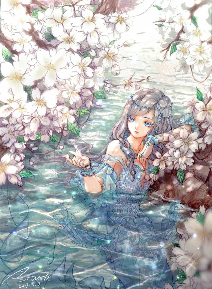 1girl, absurdres, astar0w0, bare_shoulders, blue_dress, blue_eyes, blue_sleeves, blue_wrist_cuffs, center_frills, cherry_blossoms, circlet, colored_eyelashes, commentary_request, cowboy_shot, dated, day, detached_sleeves, dress, flower, frilled_sleeves, frilled_wrist_cuffs, frills, grey_hair, hair_spread_out, highres, jewelry, light_particles, lips, long_dress, looking_at_hand, mermaid, miracle_nikki, monster_girl, necklace, nikki_(series), ocean_dream_(miracle_nikki), outdoors, parted_lips, partial_commentary, partially_submerged, petals, pink_lips, river, short_sleeves, sidelocks, signature, solo, sparkle, strapless, strapless_dress, tree, wavy_hair, white_flower, wide_sleeves, wrist_cuffs