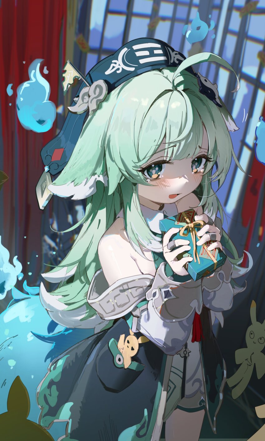 1girl, absurdres, ahoge, animal_ears, bare_shoulders, blue_fire, blurry, blurry_background, blush, box, coria, detached_sleeves, fiery_tail, fire, fox_ears, fox_girl, from_above, gift, gift_box, glowing_tail, green_eyes, green_hair, hair_ornament, hat, highres, holding, holding_gift, honkai:_star_rail, honkai_(series), huohuo_(honkai:_star_rail), indoors, jewelry, lappet, long_hair, long_sleeves, looking_at_viewer, meandros_trim, multiple_rings, open_mouth, paper_doll, paw-shaped_pupils, ring, shorts, shy, solo, symbol-shaped_pupils, tail, talisman, tearing_up, yin_yang_hair_ornament, zhuang_hat