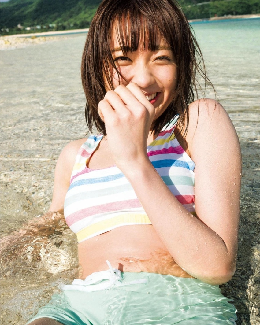 1girl, beach, bikini, black_hair, blurry, blurry_background, highres, looking_at_viewer