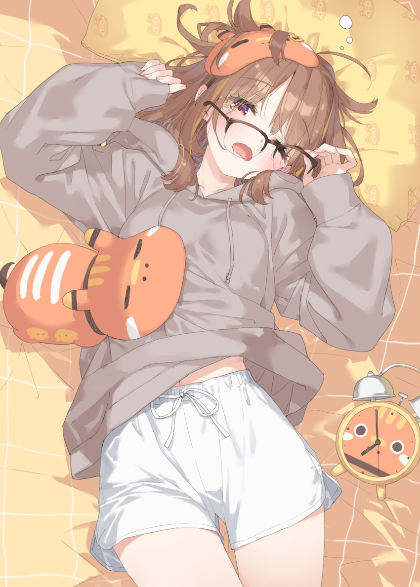 1girl, alarm_clock, arm_up, bed_sheet, black-framed_eyewear, brown_hair, clock, commentary_request, drawstring, drooling, glasses, grey_hoodie, hand_up, highres, hood, hood_down, hoodie, kani_biimu, long_sleeves, looking_at_viewer, lying, mask, mask_on_head, midriff_peek, navel, on_back, one_eye_closed, open_mouth, over-rim_eyewear, pillow, pinching_sleeves, puffy_long_sleeves, puffy_sleeves, purple_eyes, semi-rimless_eyewear, sendo_yuuhi, sendo_yuuhi_(loungewear), short_shorts, shorts, sleep_mask, sleeves_past_wrists, solo, tears, virtual_youtuber, vspo!, white_shorts