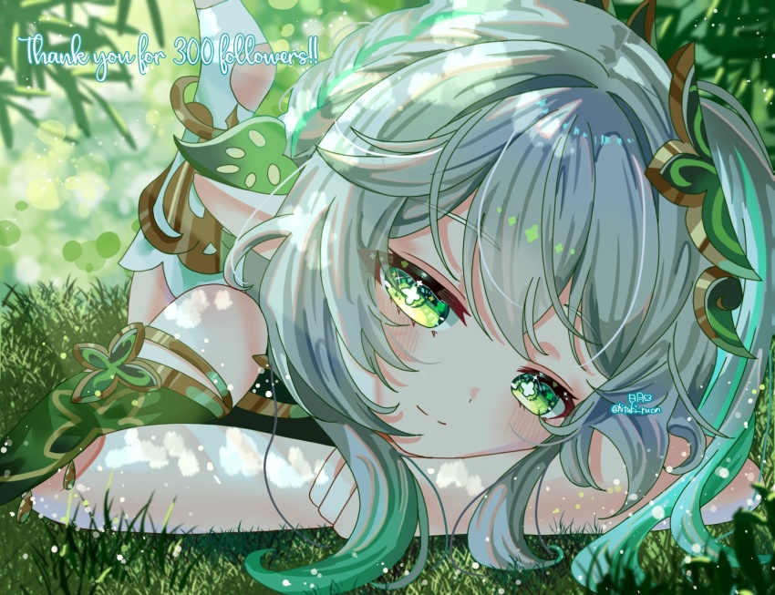1girl, bare_shoulders, blush, closed_mouth, commentary, cross-shaped_pupils, day, detached_sleeves, genshin_impact, gradient_hair, grass, green_eyes, green_hair, green_sleeves, hair_between_eyes, hair_ornament, hashtag-only_commentary, highres, hitsuki_(ruon), leaf_hair_ornament, long_hair, looking_at_viewer, lying, multicolored_hair, nahida_(genshin_impact), on_ground, on_stomach, outdoors, pointy_ears, sleeveless, smile, solo, symbol-shaped_pupils, thank_you, twitter_username, white_hair