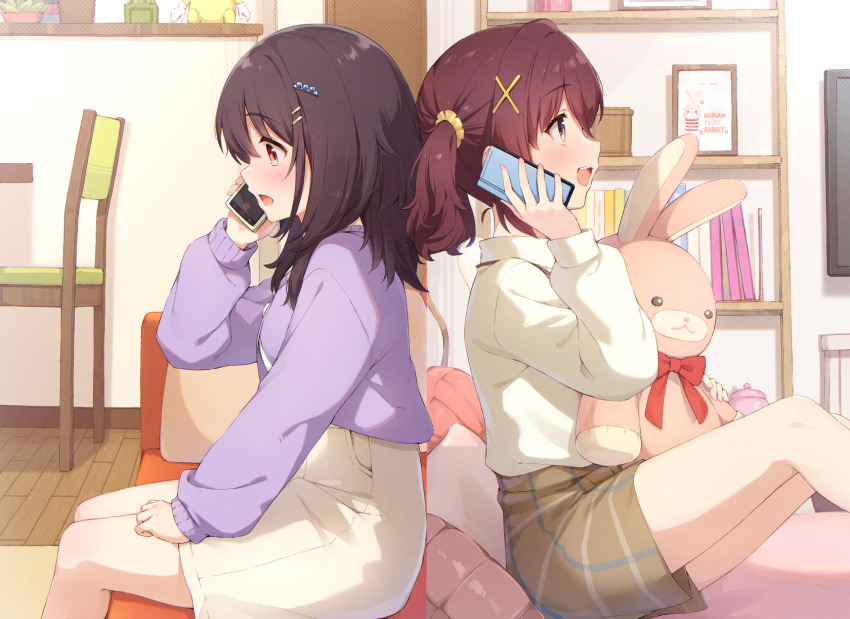 2girls, bedroom, black_hair, bookshelf, brown_eyes, brown_shorts, cellphone, chair