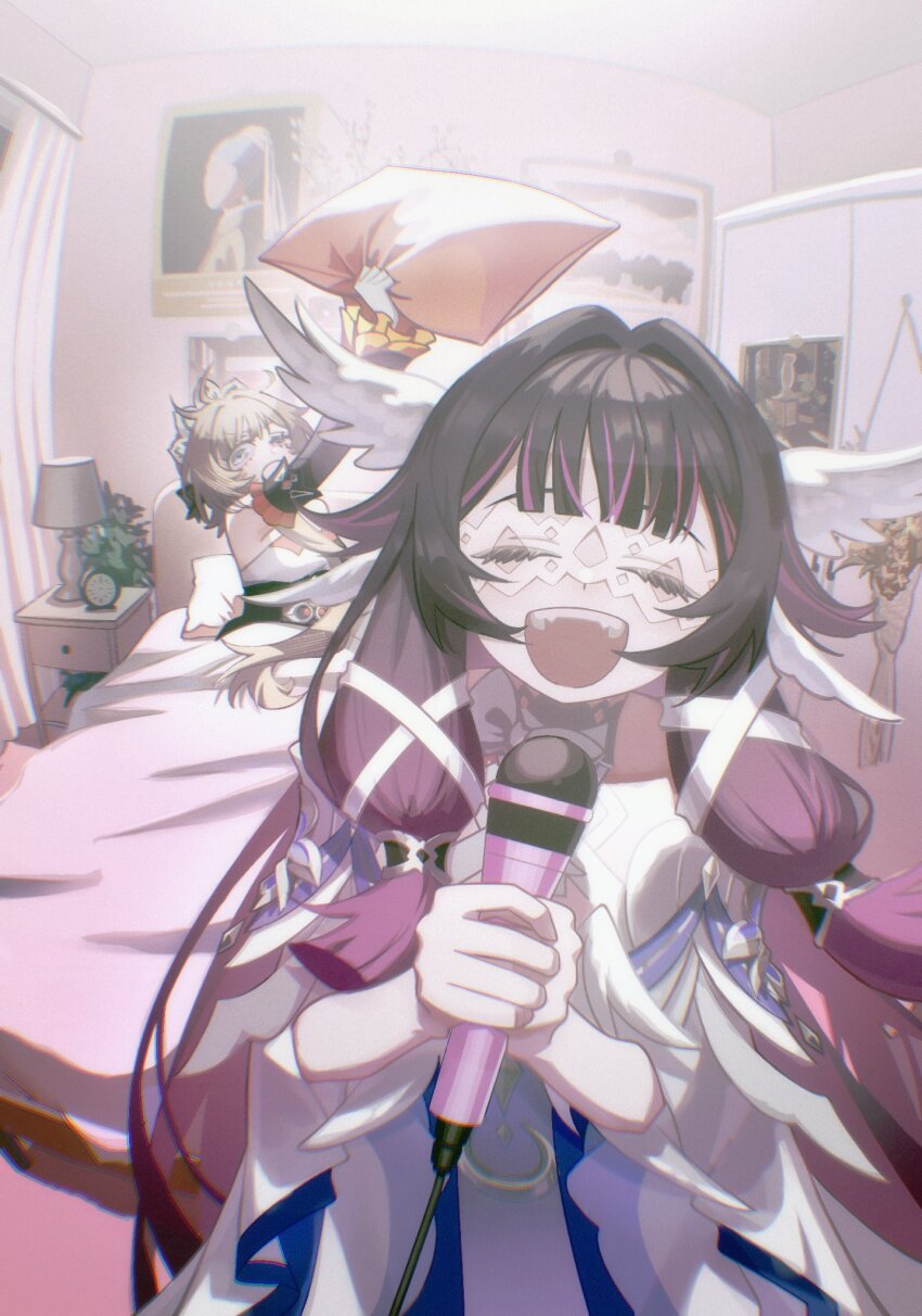 2girls, arm_up, bed, big_itachi, black_hair, closed_eyes, columbina_(genshin_impact), commentary, contemporary, detached_sleeves, dress, english_commentary, eye_mask, facing_viewer, genshin_impact, grey_hair, hair_intakes, half-closed_eye, head_wings, headdress, highres, holding, holding_microphone, holding_pillow, indoors, long_hair, looking_at_another, mask, microphone, multicolored_hair, multiple_girls, multiple_wings, on_bed, open_mouth, pillow, purple_hair, sandrone_(genshin_impact), sitting, teeth, two-tone_hair, upper_teeth_only, very_long_hair, white_headdress, white_mask, wings