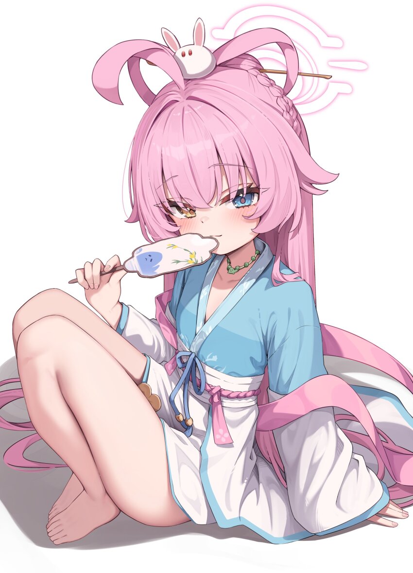 1girl, absurdres, ahoge, barefoot, blue_archive, blue_eyes, blush, braid, closed_mouth, commentary, hair_between_eyes, halo, hand_fan, heterochromia, highres, holding, holding_fan, hoshino_(blue_archive), hoshino_(mid-autumn_festival)_(blue_archive), japanese_clothes, kimono, knees_up, long_hair, long_sleeves, looking_at_viewer, mannack, paper_fan, pink_hair, pink_halo, simple_background, smile, solo, white_background, yellow_eyes