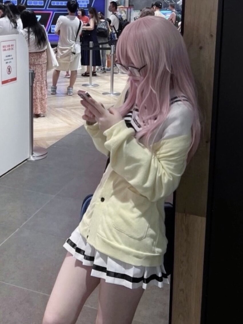 1girl, bag, black_neckerchief, blue_bag, breasts, cardigan, cellphone, closed_eyes