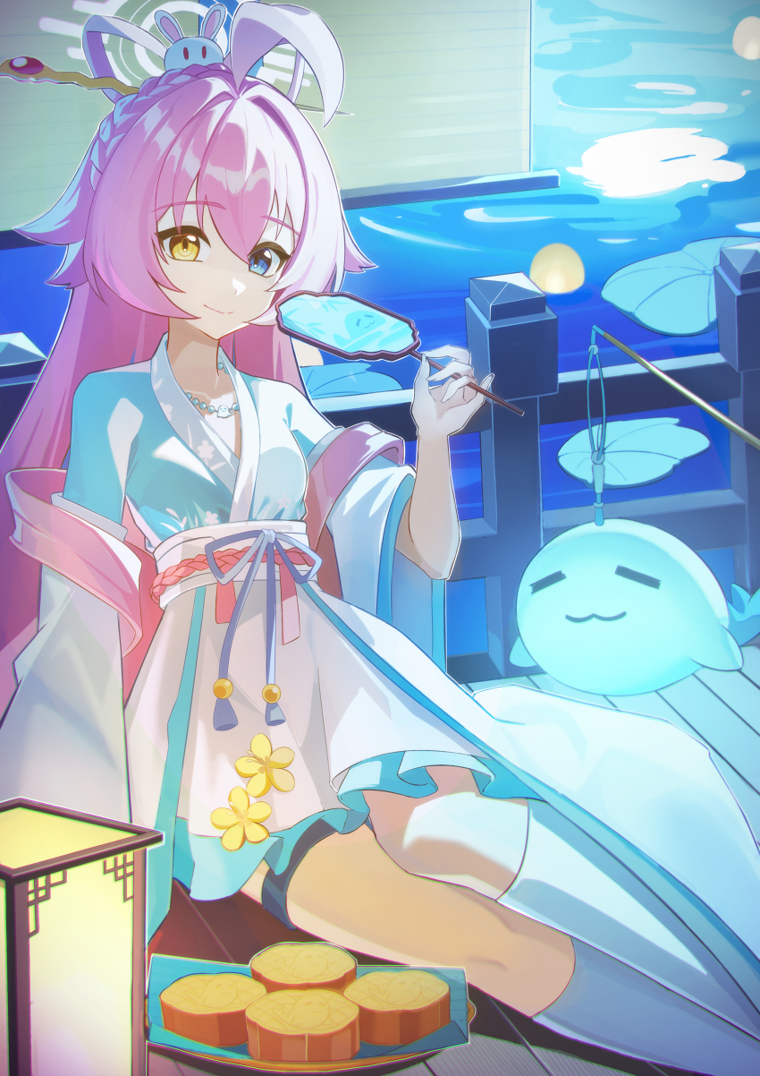 1girl, absurdres, ahoge, blue_archive, blue_eyes, chinese_clothes, closed_mouth, food, guquenanfei, hair_between_eyes, hair_ornament, hair_rings, halo, hand_fan, heterochromia, highres, holding, holding_fan, hoshino_(blue_archive), hoshino_(mid-autumn_festival)_(blue_archive), lantern, leg_ribbon, long_hair, long_sleeves, looking_at_viewer, mooncake, paper_fan, pink_hair, ribbon, sitting, smile, socks, solo, tuanshan, uchiwa, water, yellow_eyes