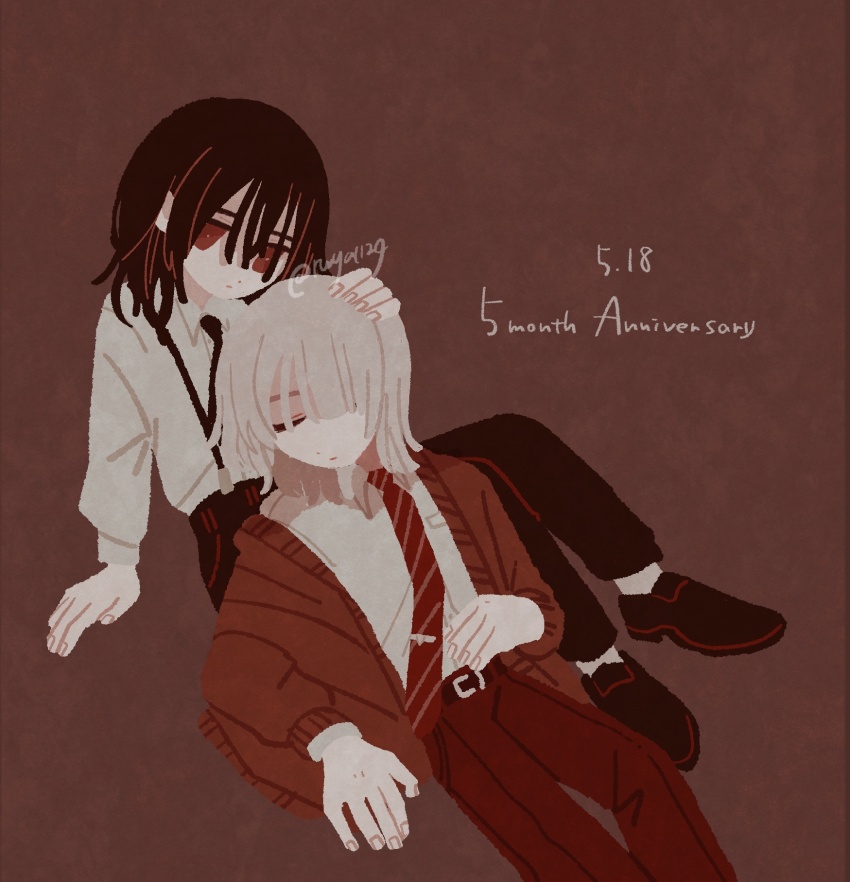 2boys, anniversary, black_hair, black_pants, brown_background, brown_cardigan, brown_pants, cardigan