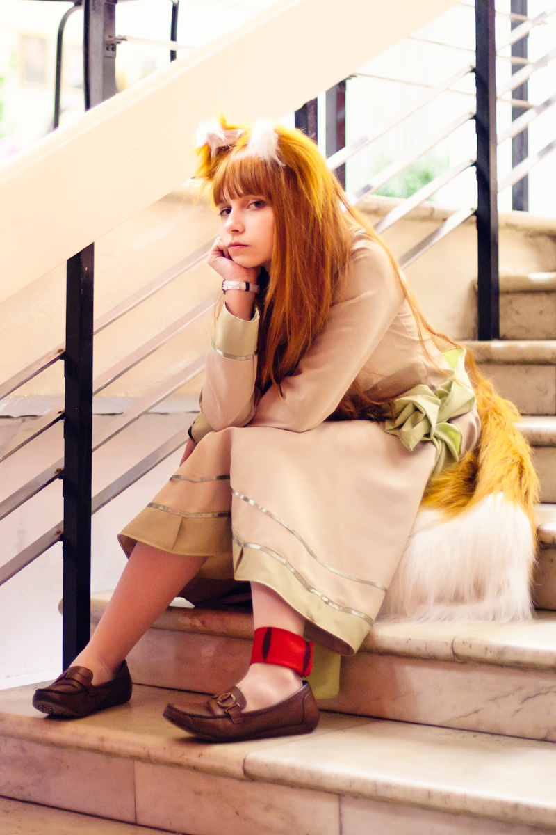 anastasiya_reznikova, cosplay, dress, highres, holo, holo_(cosplay), photo_(medium), sitting, spice_and_wolf, tagme