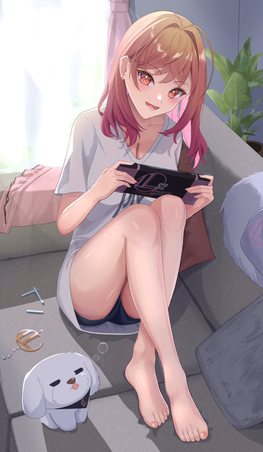 1girl, :d, ahoge, barefoot, black_shorts, colored_inner_hair, commentary_request, couch