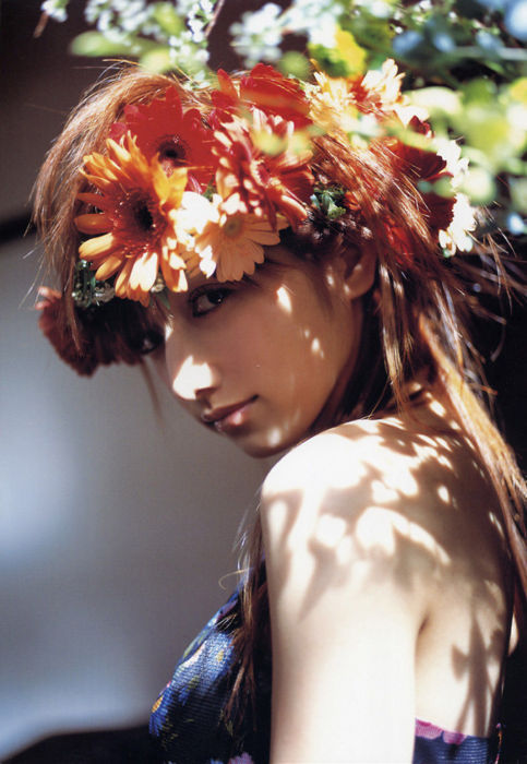 1girl, brown_hair, dappled_sunlight, female_focus, flower, goto_maki, hair_flower, hair_ornament