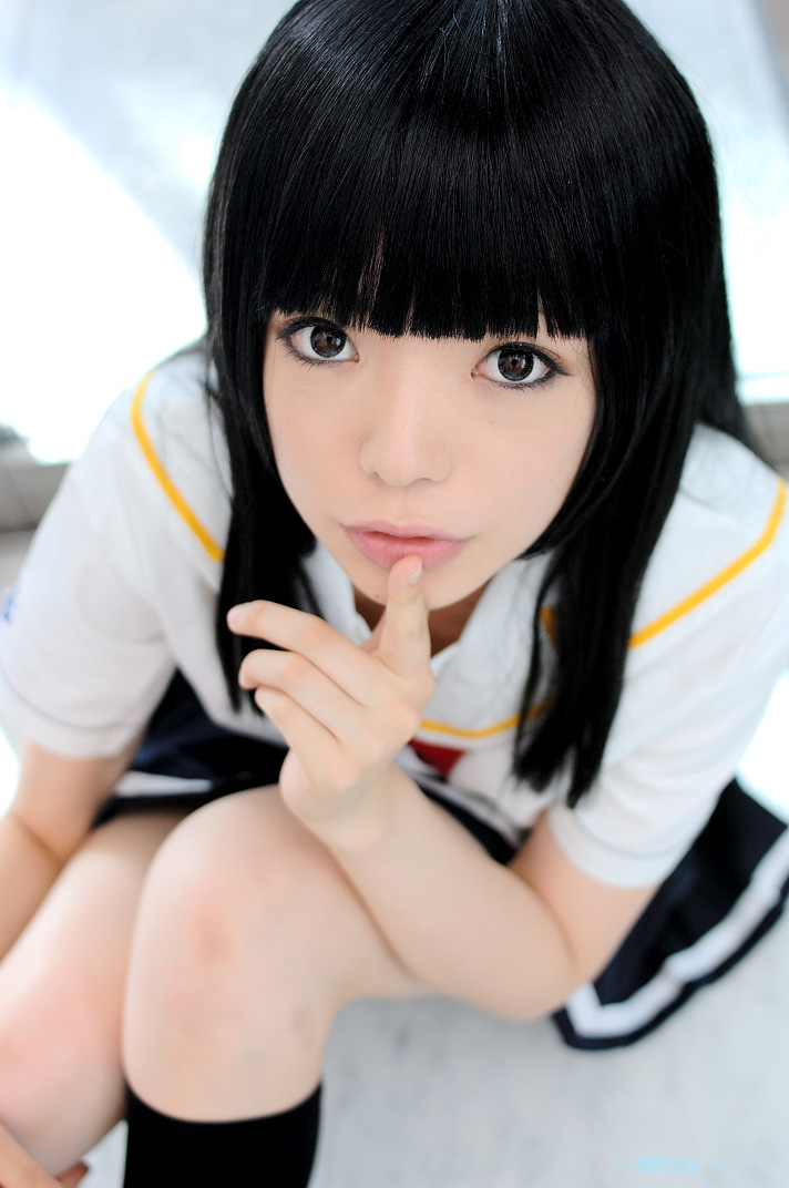 1girl, black_hair, blunt_bangs, blurry, breasts, cosplay, depth_of_field, east_asian, eyeliner, female_focus, finger_to_mouth, from_above, futami_eriko, futami_eriko_(cosplay), indoors, kimi_kiss, kneehighs, long_hair, looking_at_viewer, makeup, miniskirt, namada, on_floor, photo_(medium), pleated_skirt, school_uniform, serafuku, shushing, sitting, skirt, small_breasts, socks, solo