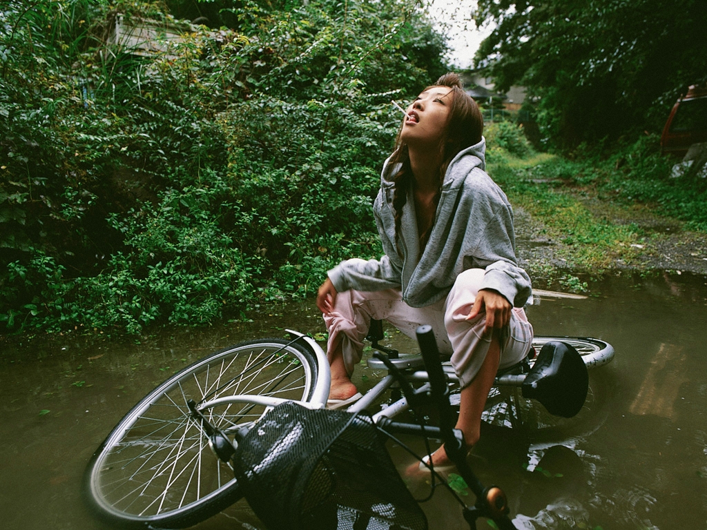 ando_sayaka, bicycle, hood, hoodie, mud, photo_(medium), pond, running_pants
