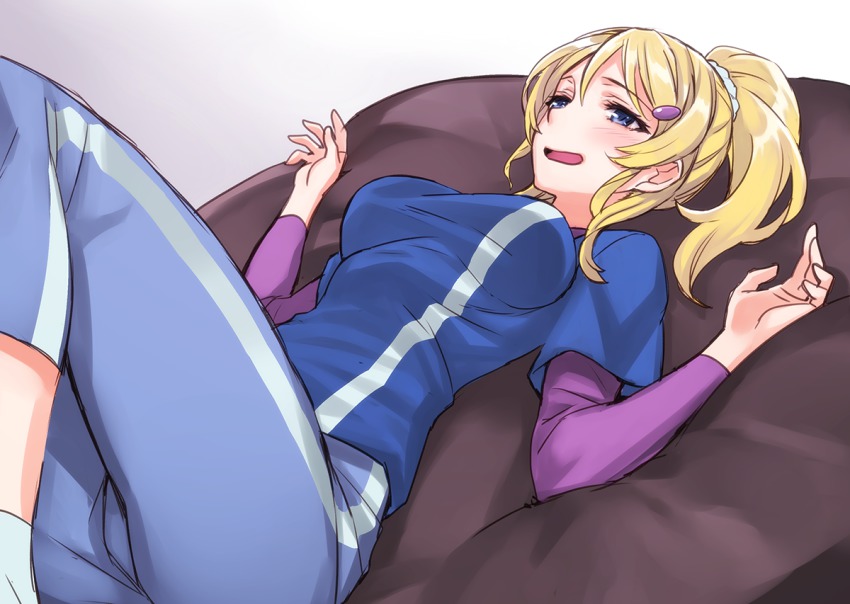 10s, 1girl, ayase_eli, bean_bag_chair, blonde_hair, blue_eyes, blush, female_focus, hair_ornament, hairclip, long_hair, long_sleeves, love_live!, love_live!_school_idol_festival, love_live!_school_idol_project, lying, matsuryuu, muji_body_fitting_sofa, on_back, open_mouth, pants, ponytail, shirt, smile, solo, t-shirt, track_pants