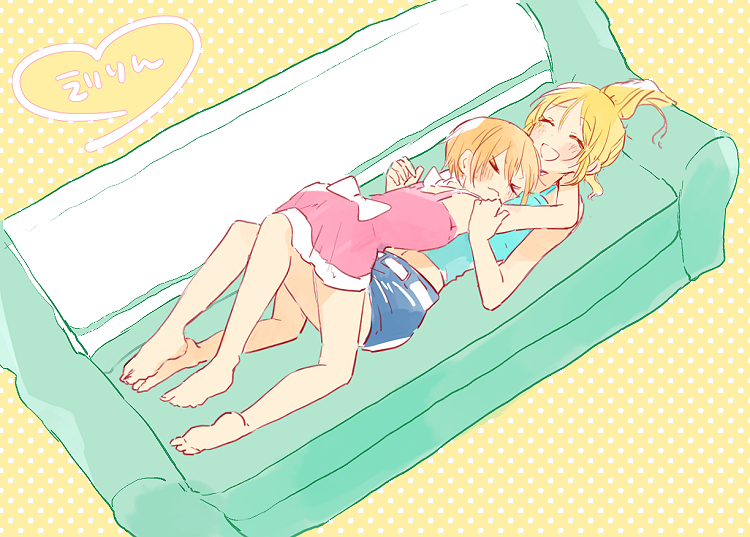 >_<, 10s, 2girls, :d, ayase_eli, barefoot, between_breasts, blonde_hair, blush, bow, breasts, couch, denim, denim_shorts, dress, closed_eyes, head_between_breasts, hoshizora_rin, hug, kyokutsuki, long_hair, love_live!, love_live!_school_idol_project, lying, multiple_girls, on_back, open_mouth, orange_hair, polka_dot, polka_dot_background, short_hair, shorts, smile, yuri