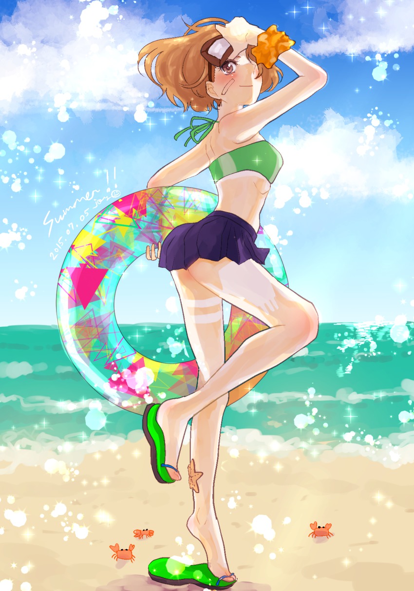 10s, 1girl, beach, blush, brown_hair, cloud, crab, day, female_focus, flip-flops, goggles, gradient_background, highres, joi_kun_(senzai_hiyori), kantai_collection, oboro_(kancolle), ocean, outdoors, sandals, sky, solo, spray, standing, standing_on_one_leg, starfish, tan, tanline, water
