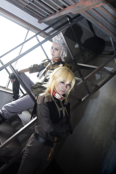 blonde_hair, boots, cosplay, east_asian, fingerless_gloves, gloves, gundam, gundam_side_story:_from_place_beyond_the_blaze