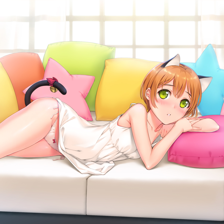 10s, 1girl, animal_ears, bell, bow, brown_hair, cat_ears, cat_tail, cushion, female_focus, green_eyes, highres, hoshizora_rin, love_live!, love_live!_school_idol_project, lying, mignon, on_side, orange_hair, panties, parted_lips, pillow, ribbon, short_hair, side-tie_panties, solo, tail, tail_bell, tail_bow, tail_ornament, tail_ribbon, underwear