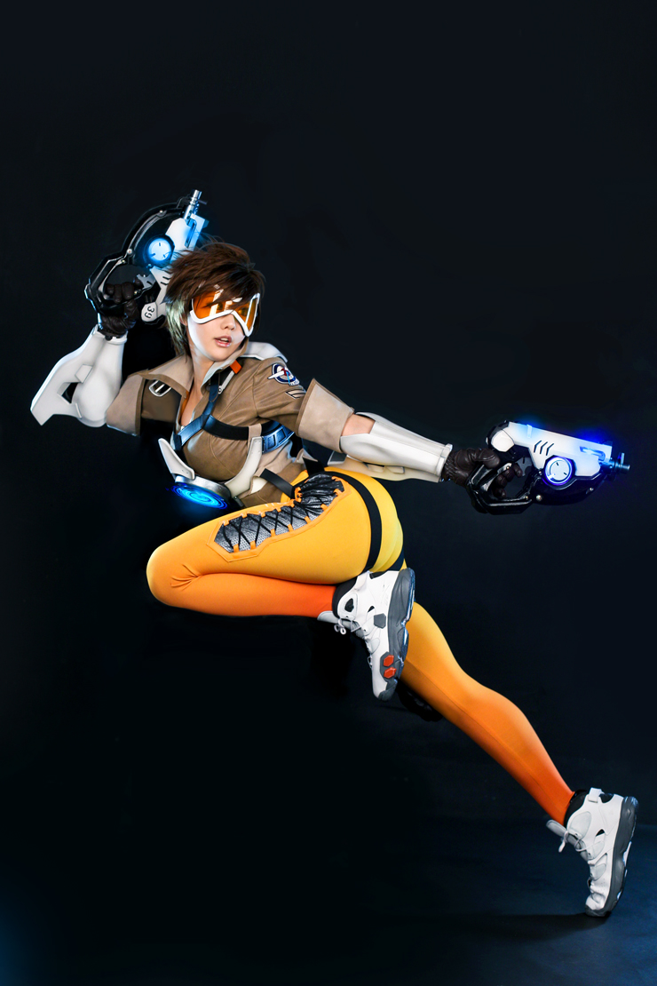 1girl, bodysuit, cosplay, east_asian, female_focus, gun, overwatch, overwatch_1