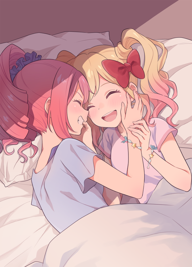 10s, 2girls, aikatsu!, aikatsu!_(series), aikatsu_stars!, bed, bed_sheet, blonde_hair, blue_shirt, blush, bow, bracelet, closed_eyes, frills, gobou_1000, gradient_hair, grin, hair_bow, hand_on_another's_cheek, hand_on_another's_face, happy, jewelry, multicolored_hair, multiple_girls, nijino_yume, on_bed, open_mouth, pillow, pink_hair, pink_shirt, red_bow, red_hair, sakuraba_rola, shirt, short_sleeves, sidelocks, smile, twintails, yuri
