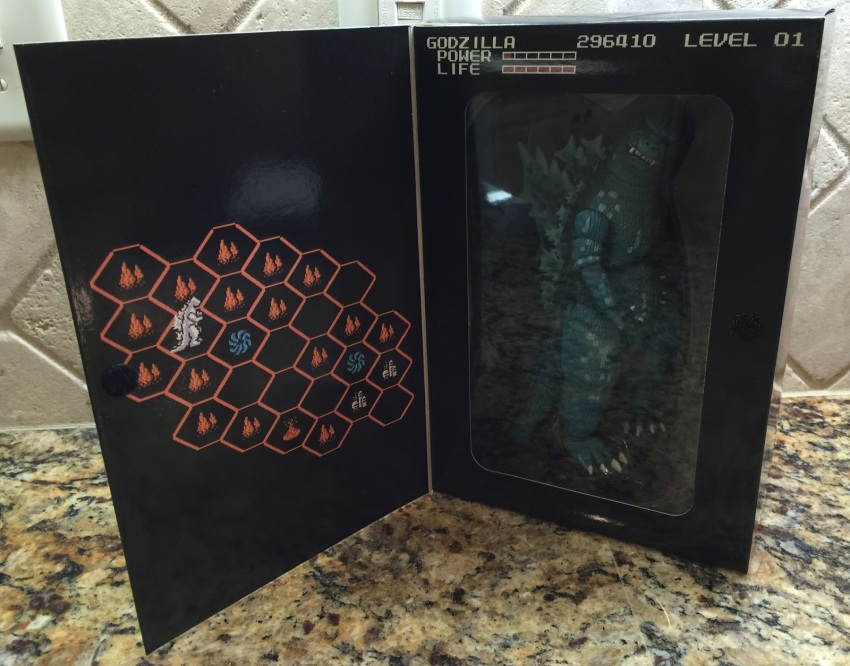 box_art, compile_corporation, dinosaur, figure, game_console, giant, giant_monster, godzilla, godzilla:_monster_of_monsters!, godzilla_(series), highres, kaiju, monster, neca, nes, nintendo, official_art, pixel, red_eyes, retro_artstyle, toho, toy