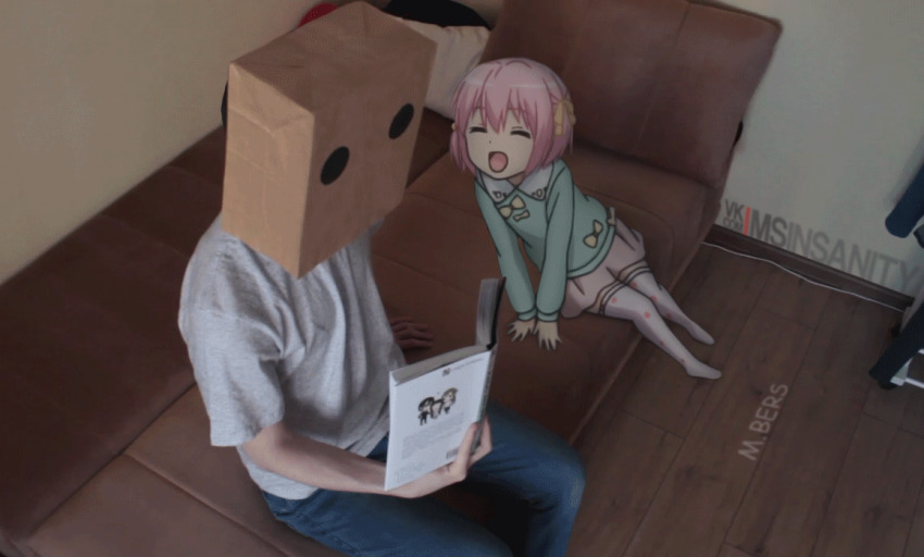 1boy, 1girl, animated, animated_gif, blush, book, bow, couch, danchigai, hair_between_eyes, hair_bow, hair_ornament, mikhail_bersenyov, ms_insanity, nakano_uzuki, paper_bag_on_head, pink_hair, reading, real_life_insert, school_uniform, short_hair, sitting, sitting_on_lap, sitting_on_person, skirt, thighhighs, white_thighhighs, yellow_bow