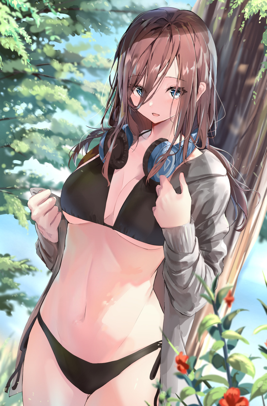 1girl, :d, absurdres, aqua_eyes, bikini, bikini_under_clothes, black_bikini, black_ribbon, blush, breasts, brown_hair, cleavage, commentary_request, cowboy_shot, day, eyes_visible_through_hair, female_focus, go-toubun_no_hanayome, grey_jacket, hair_over_one_eye, headphones, headphones_around_neck, highres, jacket, kinoruru_toiro, large_breasts, long_hair, long_sleeves, looking_at_viewer, nakano_miku, navel, open_clothes, open_jacket, open_mouth, outdoors, ribbon, side-tie_bikini_bottom, smile, solo, stomach, swimsuit, tree, undressing