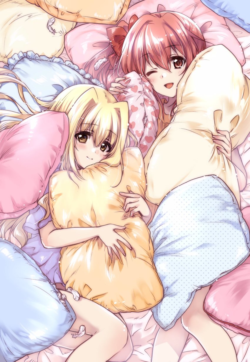 2girls, bed_sheet, blonde_hair, blue_shirt, bow, brown_eyes, closed_mouth, commentary_request, feathers, from_above, hair_bow, hair_intakes, highres, holding, holding_pillow, iris_(nanoha), kuroi_mimei, long_hair, looking_at_viewer, lying, lyrical_nanoha, mahou_shoujo_lyrical_nanoha_detonation, multiple_girls, on_back, on_bed, one_eye_closed, open_mouth, pajamas, pillow, red_eyes, red_hair, shirt, short_sleeves, smile, yuri_eberwein