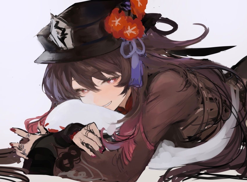 1girl, absurdres, black_hat, brown_hair, brown_shirt, chinese_clothes, flower, genshin_impact, hat, hat_flower, highres, hu_tao_(genshin_impact), jewelry, koba_(jdhikdjdkfiwufh), long_sleeves, looking_at_viewer, lying, multiple_rings, nail_polish, on_stomach, parted_lips, red_eyes, ring, shirt, simple_background, smile, solo, white_background