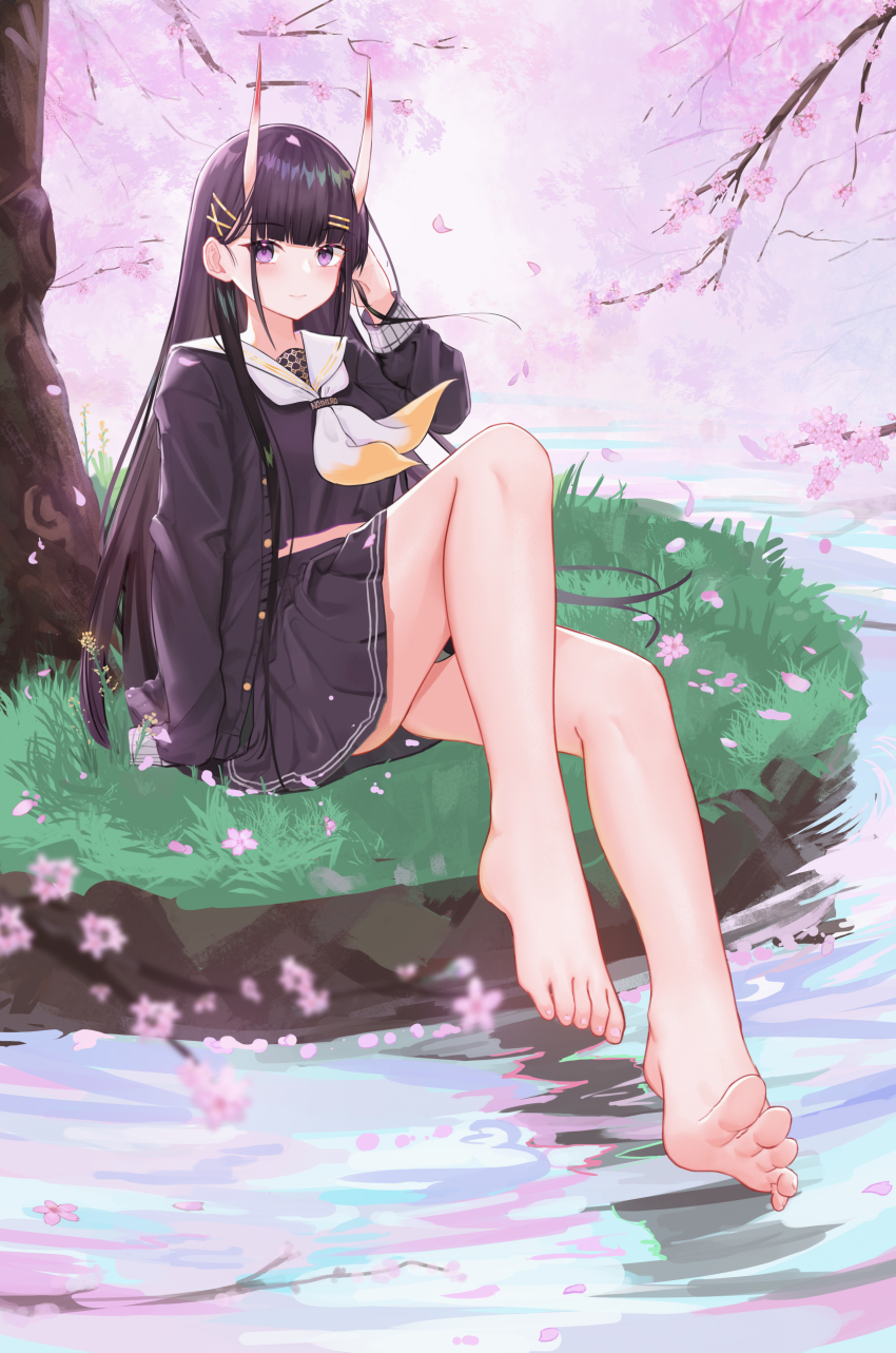 1girl, absurdres, azur_lane, barefoot, black_hair, black_serafuku, black_shirt, blouse, blunt_bangs, blush, cherry_blossoms, feet, foot_focus, foreshortening, grass, hair_ornament, hairclip, highres, horns, long_hair, looking_at_viewer, midriff_peek, neckerchief, noshiro_(azur_lane), purple_eyes, school_uniform, serafuku, shirt, skin-covered_horns, smile, soles, solo, toes, two-tone_neckerchief, very_long_hair, water, white_neckerchief, yellow_neckerchief