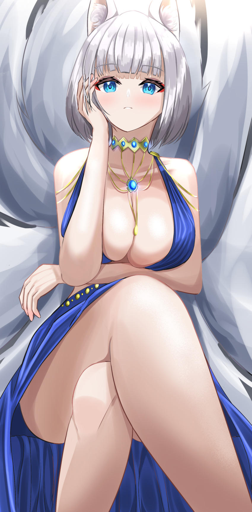 1girl, absurdres, animal_ear_fluff, arm_under_breasts, azuma_(sospower73), azur_lane, blue_dress, blue_eyes, breasts, center_opening, dress, evening_gown, eyeliner, fox_girl, halter_dress, halterneck, highres, kaga_(azur_lane), kaga_(exalted_white_wings)_(azur_lane), kitsune, kyuubi, large_breasts, large_tail, long_dress, looking_at_viewer, makeup, multiple_tails, official_alternate_costume, short_hair, simple_background, sitting, sleeveless, sleeveless_dress, solo, tail, white_hair, white_tail