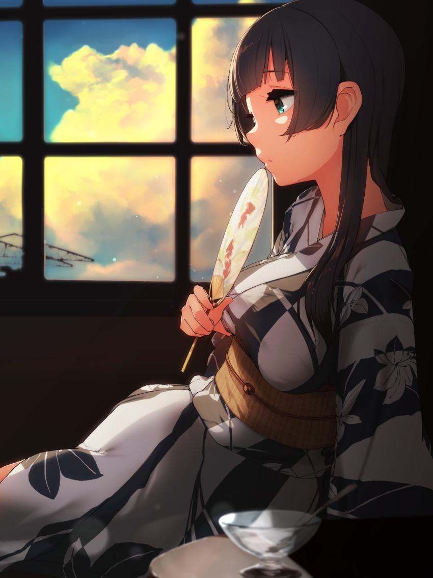 1girl, agano_(kancolle), agano_(yukata)_(kancolle), alternate_costume, black_hair, blue_eyes, bowl, breasts, cloud, day, floral_print, from_side, hand_fan, highres, indoors, japanese_clothes, kantai_collection, kimono, long_hair, medium_breasts, obi, parted_lips, profile, sash, sitting, sky, solo, spoon, suginoji, wide_sleeves, window, yukata