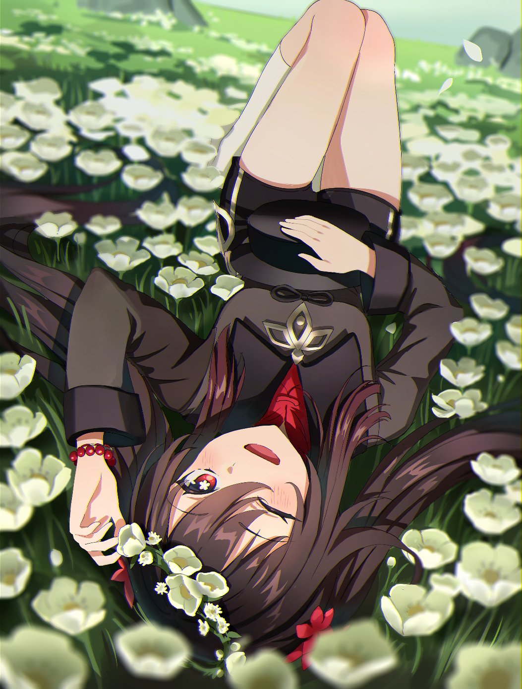 1girl, ;d, bead_bracelet, beads, black_hair, black_shorts, blurry, blush, bob_(bab67ii), bracelet, chinese_clothes, commentary_request, depth_of_field, field, flower, flower_field, from_above, genshin_impact, hair_between_eyes, hair_flower, hair_ornament, highres, hu_tao_(genshin_impact), jewelry, kneehighs, knees_together_feet_apart, knees_up, long_hair, long_sleeves, looking_at_viewer, looking_up, lying, missing_headwear, on_back, one_eye_closed, open_mouth, red_eyes, short_shorts, shorts, sidelocks, smile, socks, solo, symbol-shaped_pupils, twintails, upside-down, white_socks