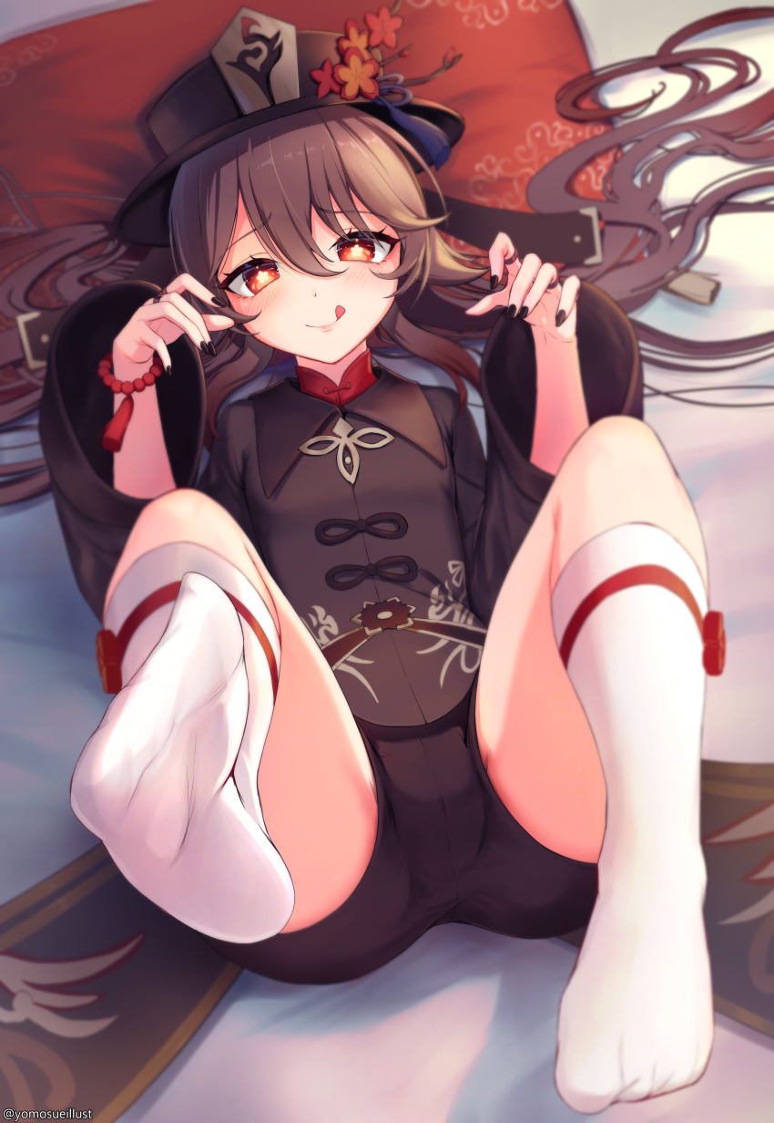 1girl, :p, absurdres, bead_bracelet, beads, bed_sheet, black_headwear, black_nails, black_shorts, blush, bracelet, chinese_clothes, claw_pose, feet_up, genshin_impact, half-closed_eyes, highres, hu_tao_(genshin_impact), jewelry, long_sleeves, looking_at_viewer, lying, nail_polish, on_back, on_bed, pillow, red_eyes, short_shorts, shorts, socks, soles, solo, sue_(frederica--bernkastel), symbol-shaped_pupils, tongue, tongue_out, twintails, white_socks, wide_sleeves