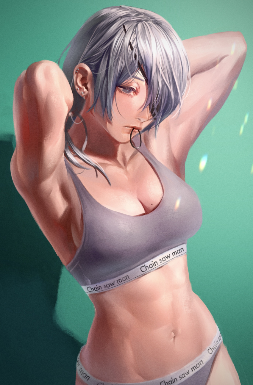 1girl, armpits, arms_behind_head, arms_up, bare_arms, breasts, chainsaw_man, closed_mouth, clothes_writing, commentary, copyright_name, ear_piercing, green_background, grey_eyes, grey_panties, grey_sports_bra, hair_over_one_eye, hair_tie_in_mouth, highres, large_breasts, looking_away, mole, mole_on_breast, mouth_hold, navel, panties, piercing, quanxi_(chainsaw_man), riki_(riki_unc), silver_hair, simple_background, solo, sports_bra, stomach, tying_hair, underwear, underwear_writing, upper_body