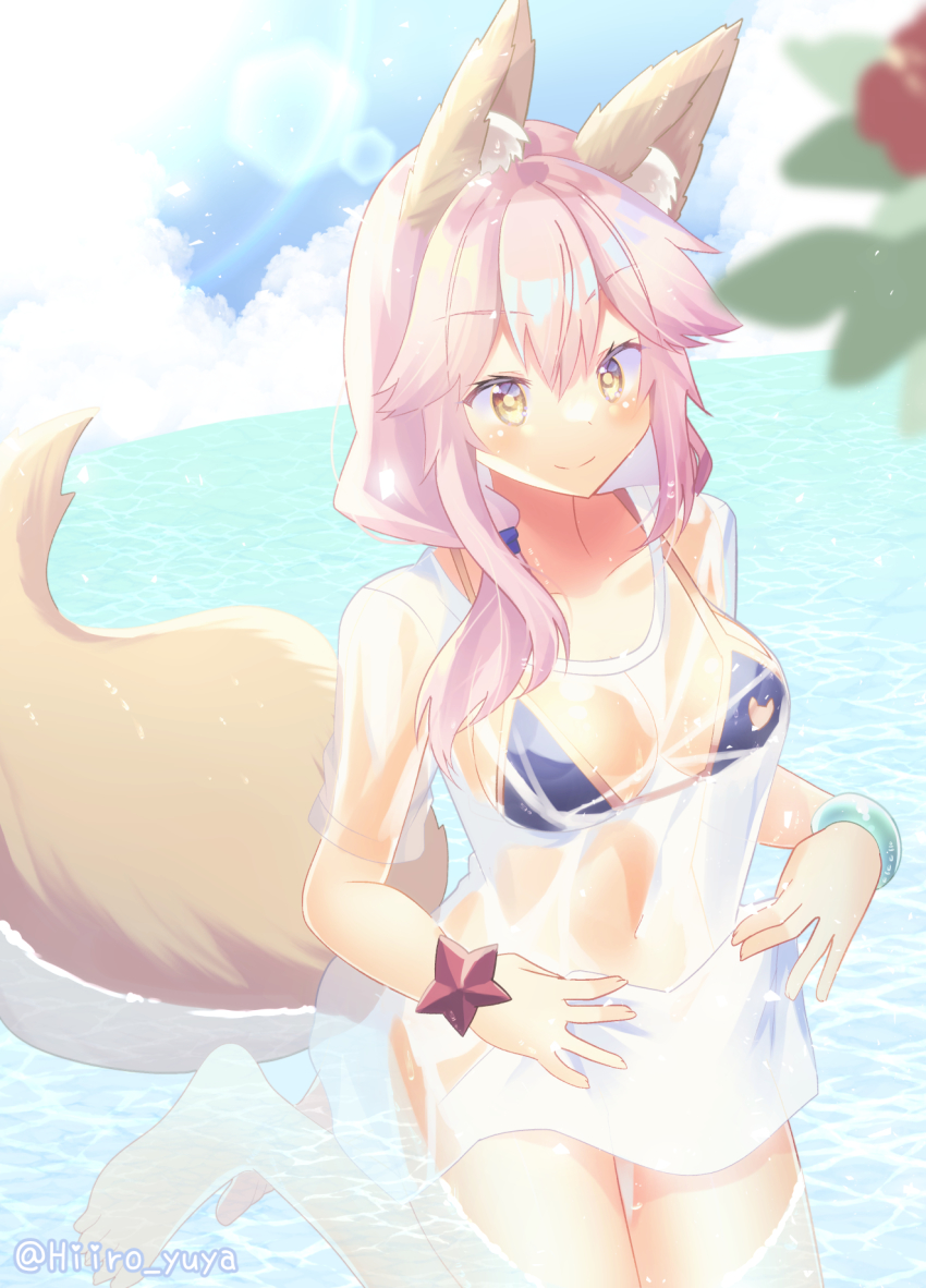 1girl, animal_ear_fluff, animal_ears, artist_name, bikini, bikini_under_clothes, blue_bikini, blush, breasts, cleavage, collarbone, covered_navel, fate/grand_order, fate_(series), fox_ears, fox_girl, fox_tail, highres, hiiro_yuya, large_breasts, looking_at_viewer, nature, ocean, outdoors, pink_hair, see-through_clothes, shirt, side-tie_bikini_bottom, sitting, solo, swimsuit, tail, tamamo_no_mae_(fate), tamamo_no_mae_(swimsuit_lancer)_(fate), tamamo_no_mae_(swimsuit_lancer)_(second_ascension)_(fate), wet, wet_clothes, wet_shirt, yellow_eyes