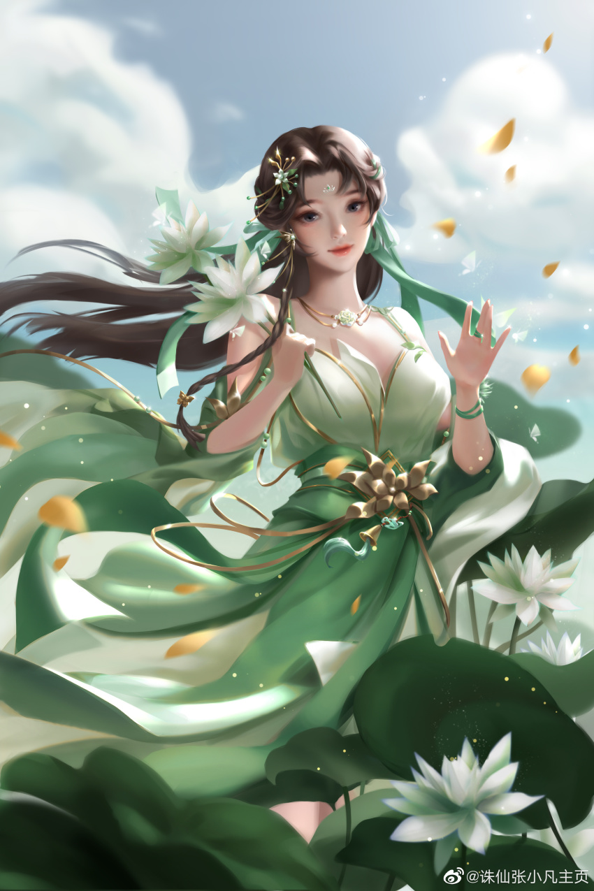 1girl, absurdres, bi_yao_(zhu_xian), blue_sky, brown_hair, chinese_clothes, cloud, dress, facial_mark, flower, forehead_mark, green_dress, gui_li_li_jin_fanchen, hair_ornament, highres, holding, holding_flower, long_hair, looking_at_viewer, petals, sky, smile, solo, upper_body, waving, zhu_xian