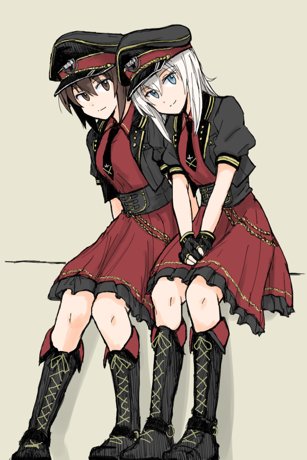 2girls, black_footwear, black_gloves, black_headwear, black_jacket, black_necktie, blue_eyes, boots, brown_eyes, brown_hair, closed_mouth, collared_dress, cosplay, cropped_jacket, dress, emblem, fingerless_gloves, frilled_dress, frills, girls_und_panzer, girls_und_panzer_senshadou_daisakusen!, gloves, grey_hair, hat, idol, itsumi_erika, itsumi_erika_(cosplay), jacket, knee_boots, kuromorimine_(emblem), lace-up_boots, leaning_forward, lolita_fashion, looking_at_viewer, medium_dress, medium_hair, multiple_girls, mutsu_(layergreen), necktie, nishizumi_maho, official_alternate_costume, peaked_cap, puffy_short_sleeves, puffy_sleeves, red_dress, short_hair, short_sleeves, side-by-side, sitting, smile, v_arms, wing_collar
