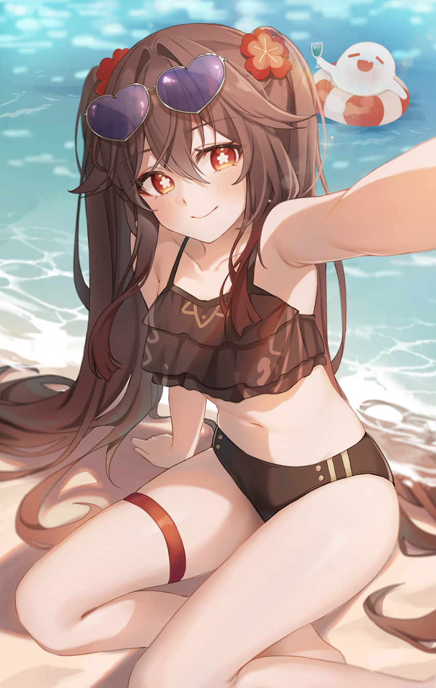 1girl, arm_support, bare_arms, beach, bikini, blush, brown_bikini, brown_hair, closed_mouth, day, eyewear_on_head, flower, flower-shaped_pupils, foot_out_of_frame, frilled_bikini, frills, genshin_impact, gya_(144), hair_between_eyes, hair_flower, hair_ornament, heart, heart-shaped_eyewear, highres, hu_tao_(genshin_impact), innertube, kurumi_(yuruyuri), long_hair, looking_at_viewer, ocean, outdoors, outstretched_hand, plum_blossoms, red_eyes, sand, selfie, sitting, smile, solo, swim_ring, swimsuit, symbol-shaped_pupils, thigh_strap, thighs, twintails, water, yokozuwari