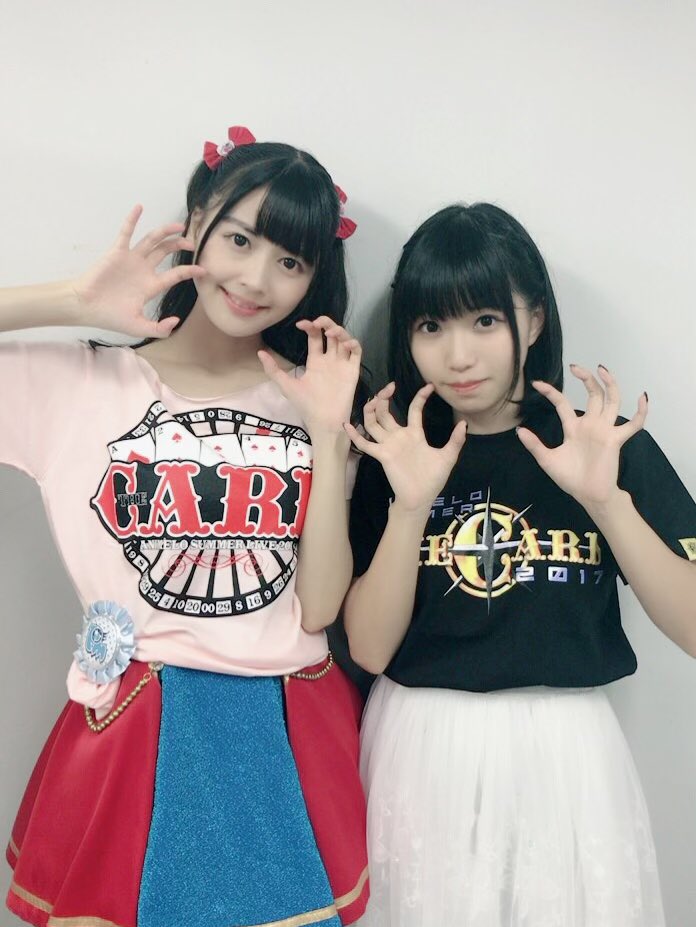 2girls, asaka, multiple_girls, photo_(medium), shirt, skirt, t-shirt, tomizawa_eri