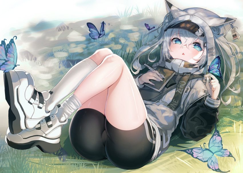 1girl, animal_ear_fluff, animal_ears, ass, bike_shorts, black_shorts, blue_eyes, book, bug, butterfly, cat_ears, ear_tag, goddess_of_victory:_nikke, grey_hair, grey_jacket, highres, insect, jacket, kneehighs, knees_up, legs, long_hair, loose_kneehigh, lying, n102_(nikke), on_back, open_mouth, outdoors, pen, rpg_(ram), shoes, shorts, socks, solo, thighs, twintails, visor_cap, white_shoes, white_socks